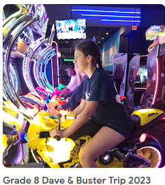 girl playing arcade game