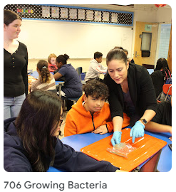 teacher assisting students in growing bacteria