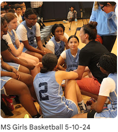 Girls Basketball Team with their gym teacher