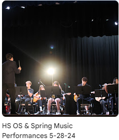 Band students playing instruments on stage