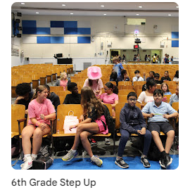 Students sitting in auditorium