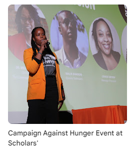 Campaign Against Hunger representative speaking on stage