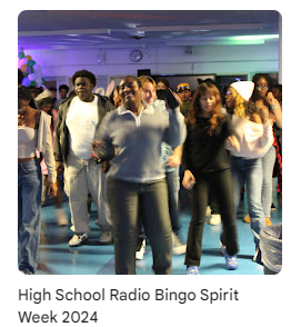 staff and students dancing in the cafeteria