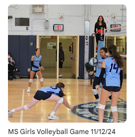 volleyball athlete diving to the floor during the game