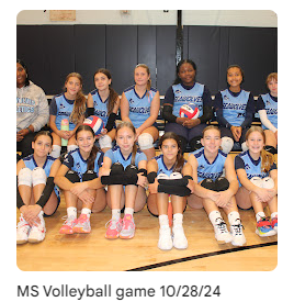 middle school volleyball athletes posing for a photo