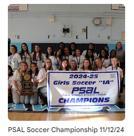 soccer athletes in the gym holding up champions title