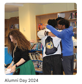 group of alumni in library