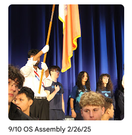 color guard raising flag on stage