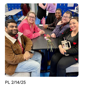 teachers sitting together at table