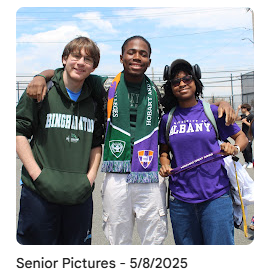 seniors displaying their college admissions in the yard