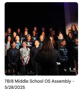 Chorus singing on stage during Outstanding Scholar