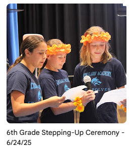 students reading an oath on stage