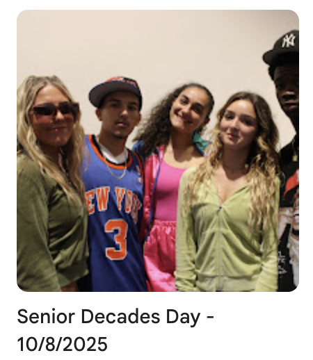 Highschool seniors taking group photo for decades day