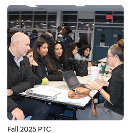 Parents talking to teacher during Parent Teacher Conference