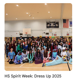 High school seniors taking photo for spirit week in gym