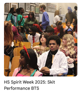 Spirit week performers sitting in auditorium
