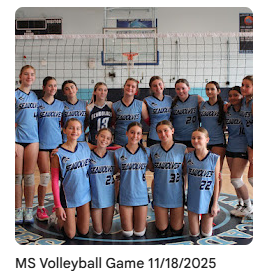 Middle school volleyball athletes taking group photo