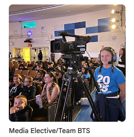 media team member in auditorium
