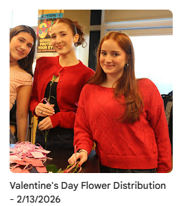 Key Club members helping distribute flowers