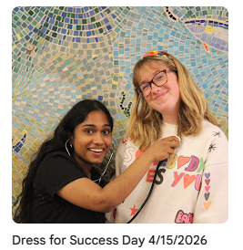 Student using stethoscope on another student