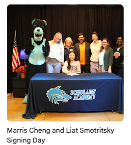 Senior Marris Cheng at table with faculty